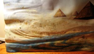 Floating Pyramids, pastel by Lawrence Tribe, art restoration