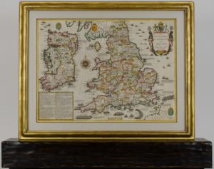 Antique map framed in double sided gilded frame with stand